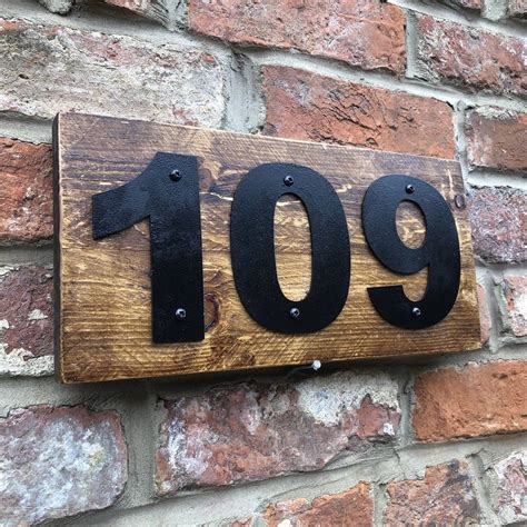 metal house numbers on wooden plaque|b&q house number signs.